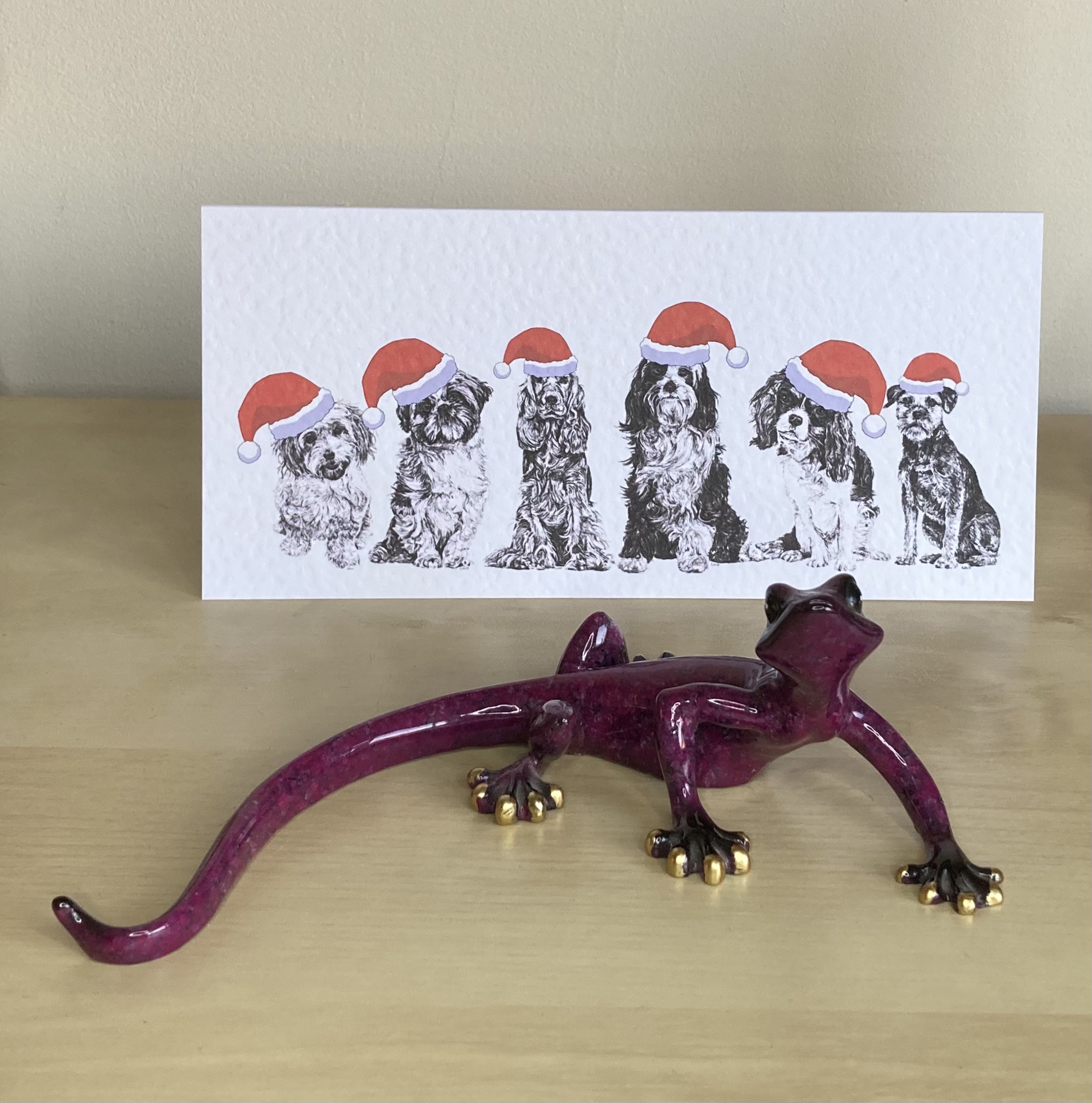 6 dogs in Santa hats Christmas card, Cavachon, Shih Tzu, Cocker Spaniel, Cavalier King Charles Spaniel, and Border Terrier by Louisa Hill