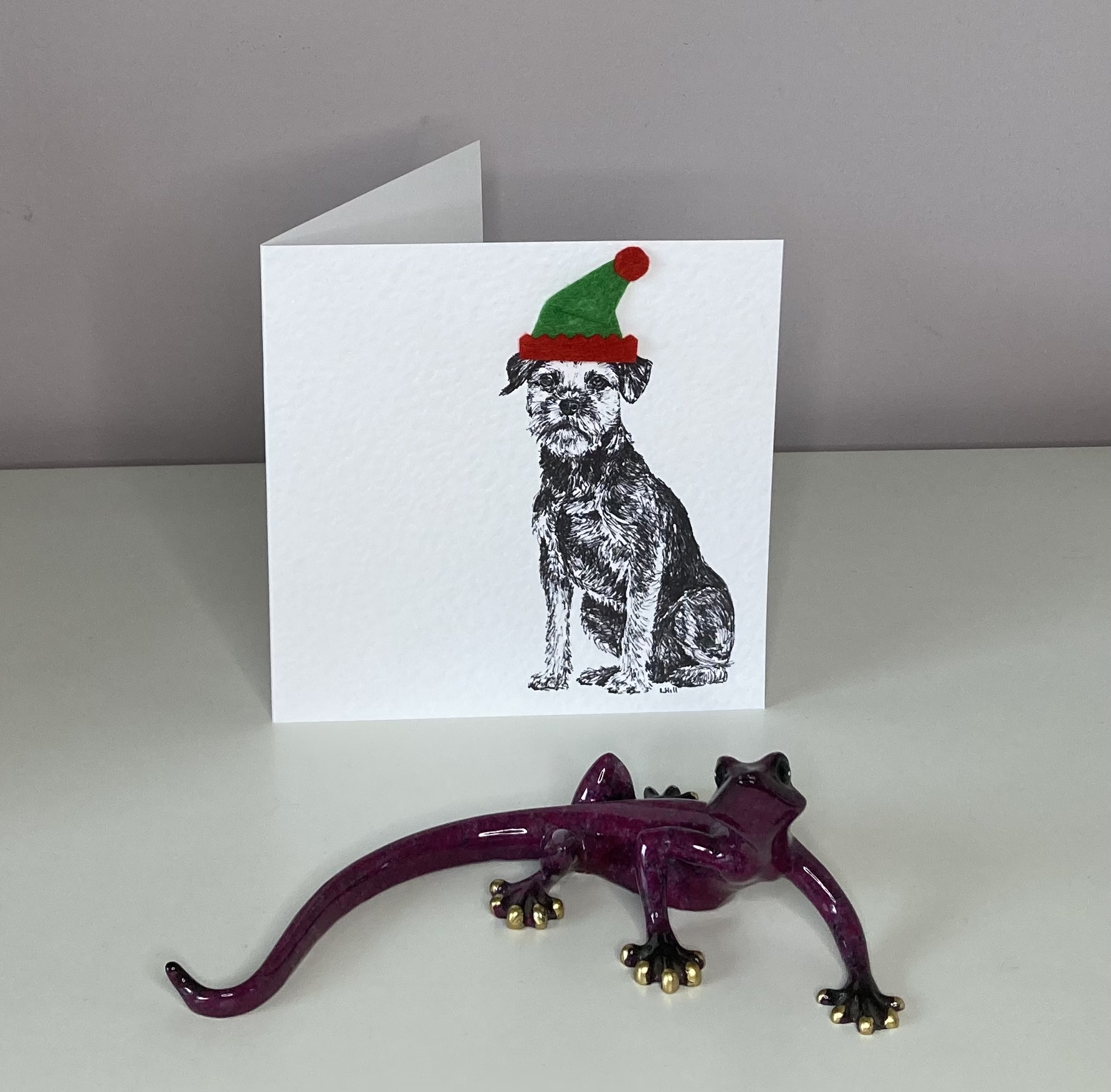 Border Terrier with elf hat Christmas card by Louisa Hill