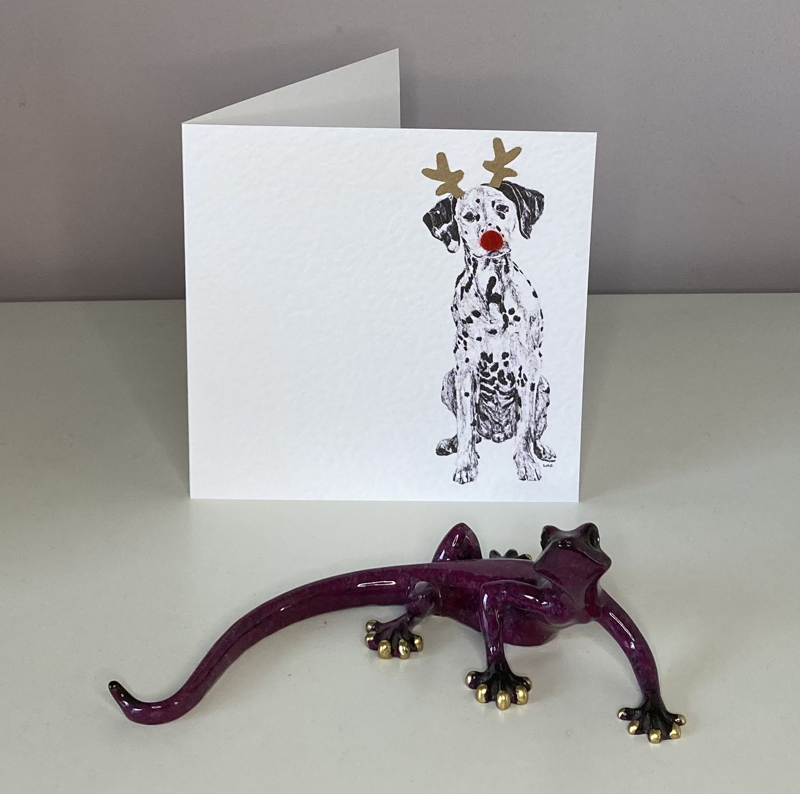 Dalmatian with reindeer antlers and red nose Christmas card by Louisa Hill