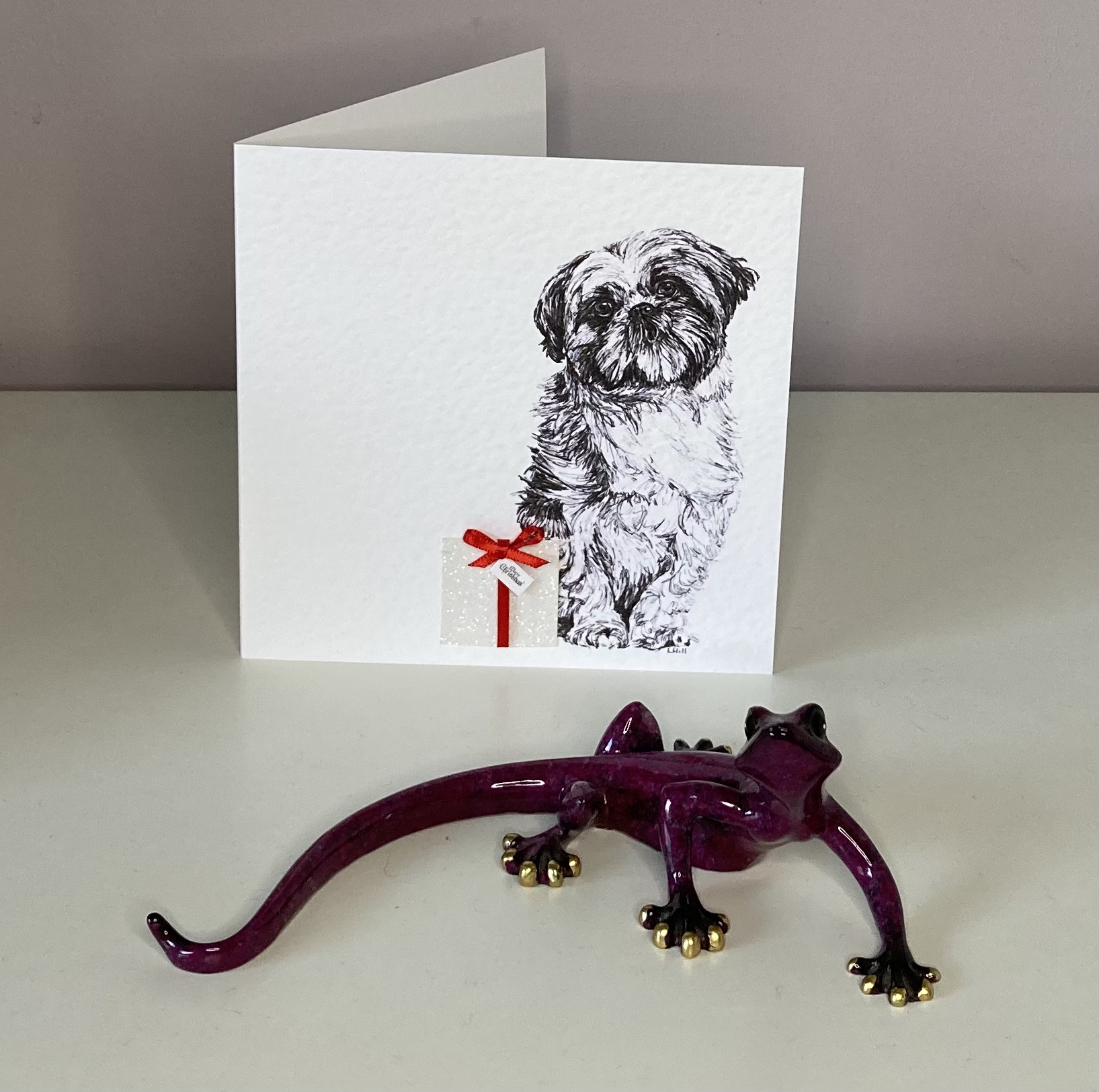 Shih Tzu with Christmas present Christmas card by Louisa Hill