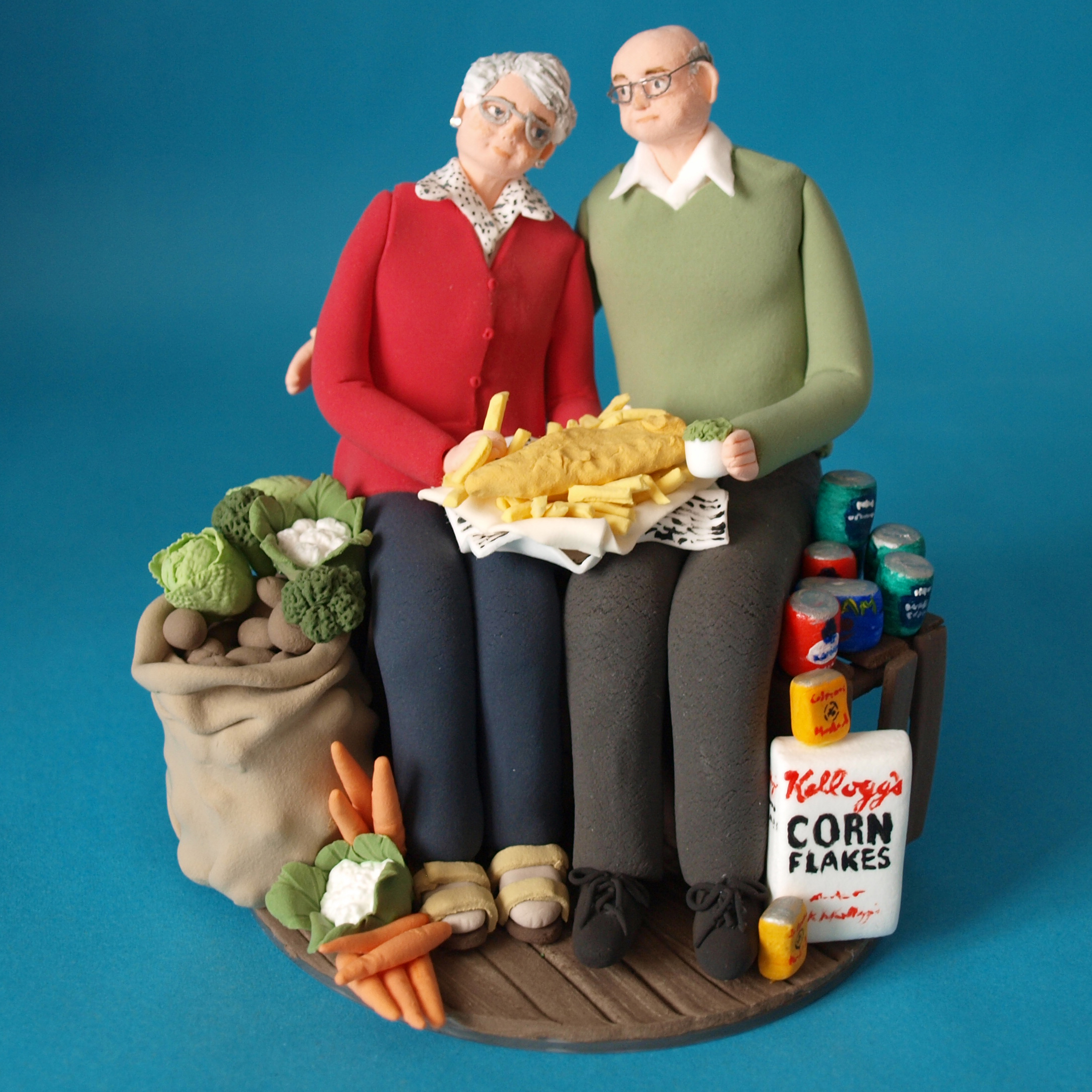Anniversary cake topper, old couple, shopkeepers, fish and chips, by Louisa Hill