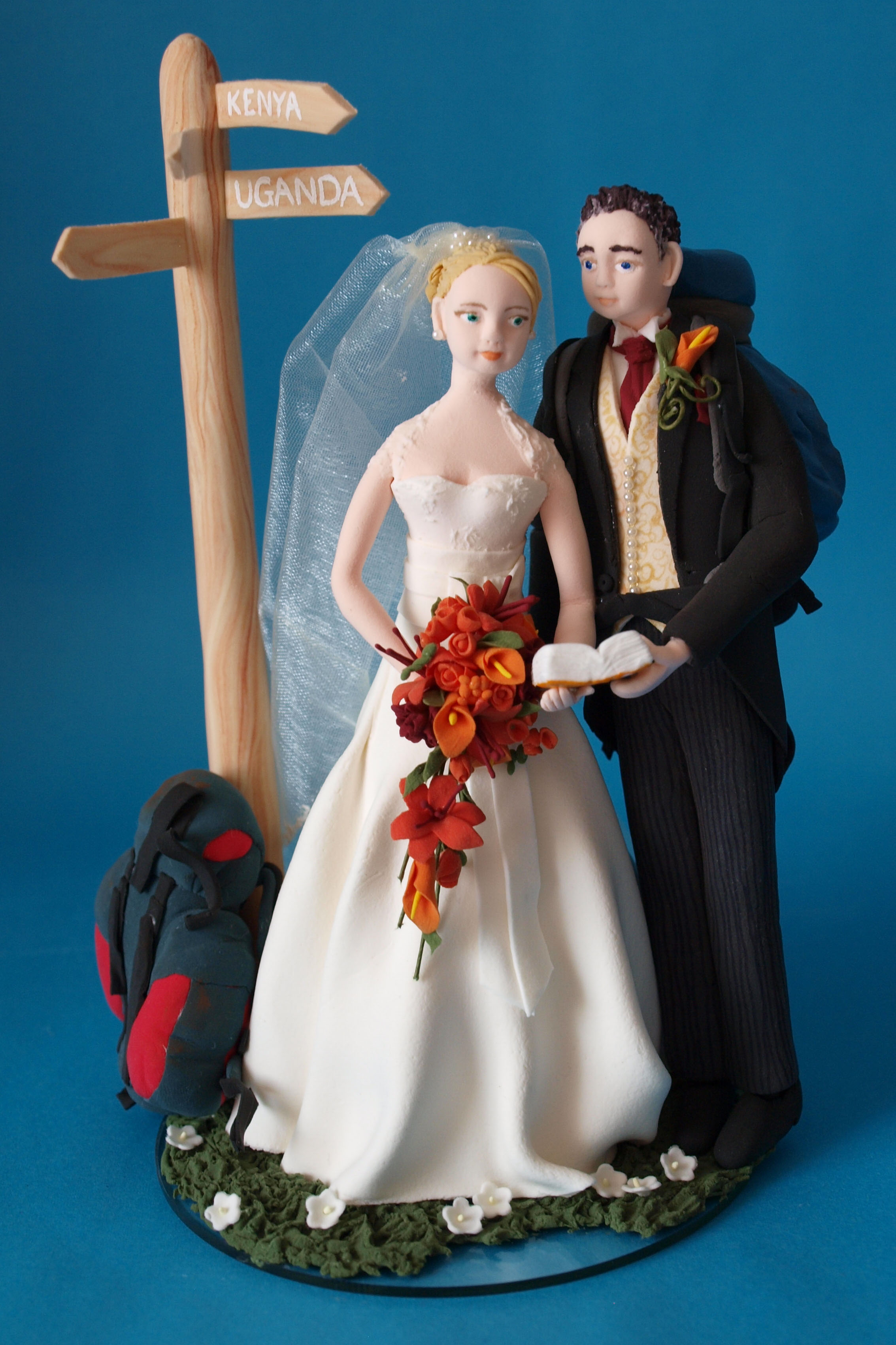Backpacking bride and groom wedding cake topper by Louisa Hill