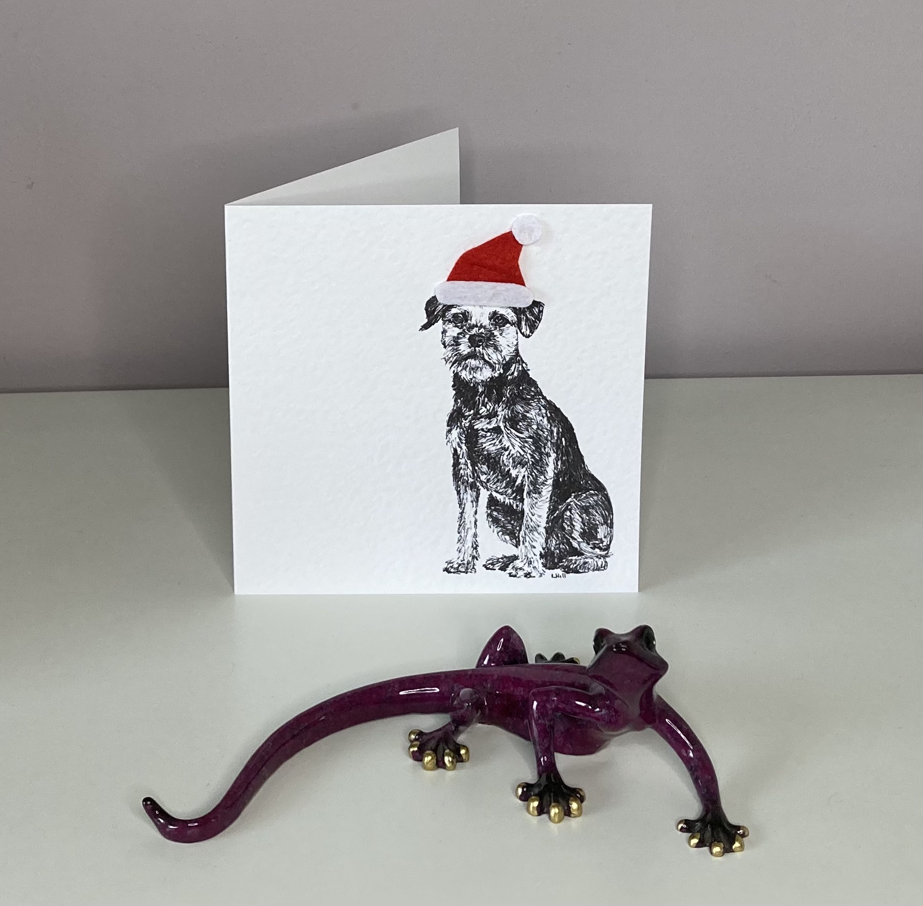 Border Terrier with Santa hat Christmas card by Louisa Hill
