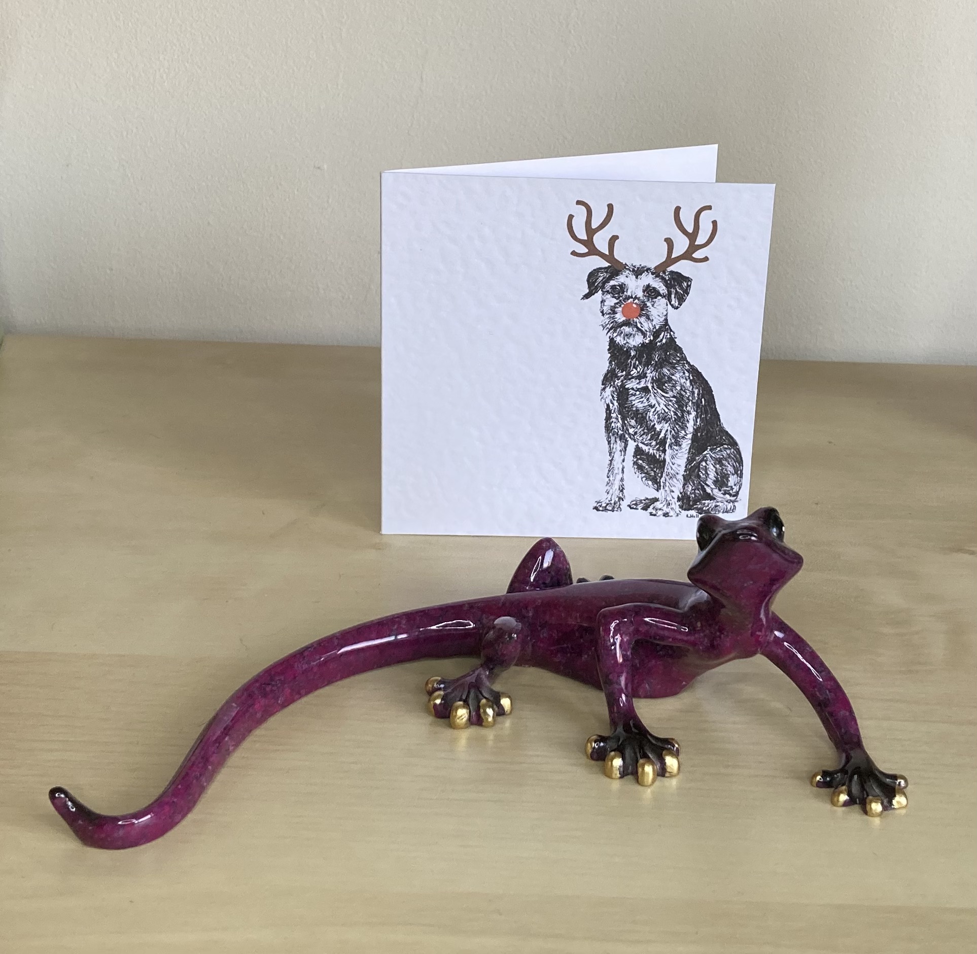 Border Terrier with Reindeer antlers and red nose Christmas card by Louisa Hill