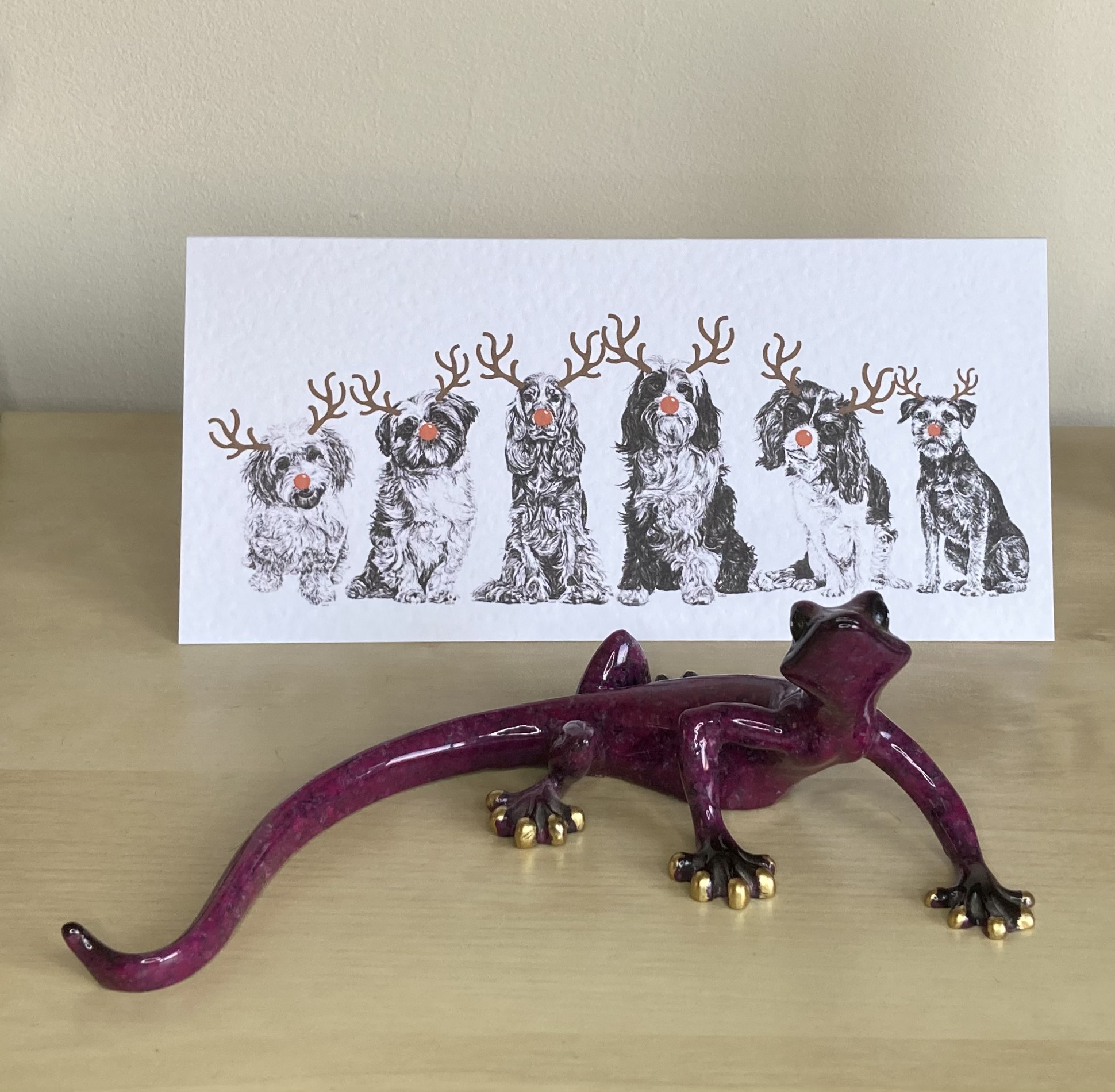 6 dogs with reindeer antlers and red noses Christmas card, Cavachon, Shih Tzu, Cocker Spaniel, Cavalier King Charles Spaniel, and Border Terrier by Louisa Hill